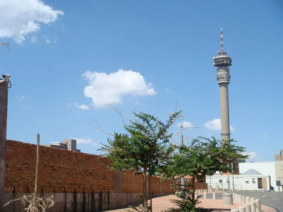 The Hillbrow Tower rising high above the Johannesburg skyline against a clear sky